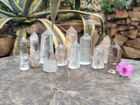 Polished Quartz Crystal Points with Various Inclusions x 11 From Madagascar