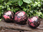 Polished Rhodonite Sphere x 3 From Ambindavato, Madagascar - Toprock Gemstones and Minerals 