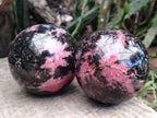 Polished Rhodonite Sphere x 3 From Ambindavato, Madagascar - Toprock Gemstones and Minerals 