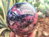 Polished Rhodonite Sphere x 3 From Ambindavato, Madagascar