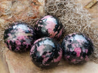 Polished Rhodonite Spheres x 4 From Ambindavato, Madagascar - Toprock Gemstones and Minerals 