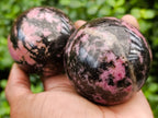 Polished Rhodonite Spheres x 4 From Ambindavato, Madagascar - Toprock Gemstones and Minerals 