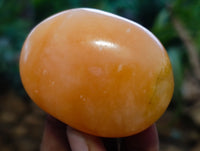 Polished Orange Twist Calcite Palm Stones x 12 From Maevantanana, Madagascar