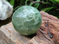 Polished Fluorescent Green Fluorite Spheres x 4 From Madagascar