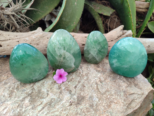Polished Fluorescent Green Fluorite Spheres x 4 From Madagascar