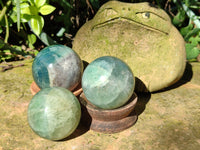 Polished Fluorescent Green Fluorite Spheres x 4 From Madagascar