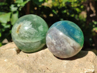 Polished Fluorescent Green Fluorite Spheres x 4 From Madagascar