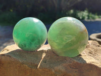 Polished Fluorescent Green Fluorite Spheres x 4 From Madagascar