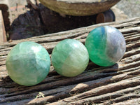 Polished Fluorescent Green Fluorite Spheres x 4 From Madagascar