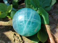 Polished Fluorescent Green Fluorite Spheres x 4 From Madagascar