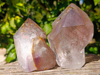 Polished Smokey Window Amethyst Twin and Scepter Quartz Crystals x 2 From Akansobe, Madagascar