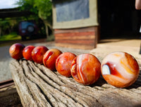 Polished Carnelian Agate Spheres x 7 From Madagascar