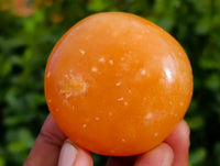 Polished Orange Twist Calcite Palm Stones x 25 From Maevantanana, Madagascar