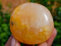 Polished Orange Twist Calcite Palm Stones x 25 From Maevantanana, Madagascar