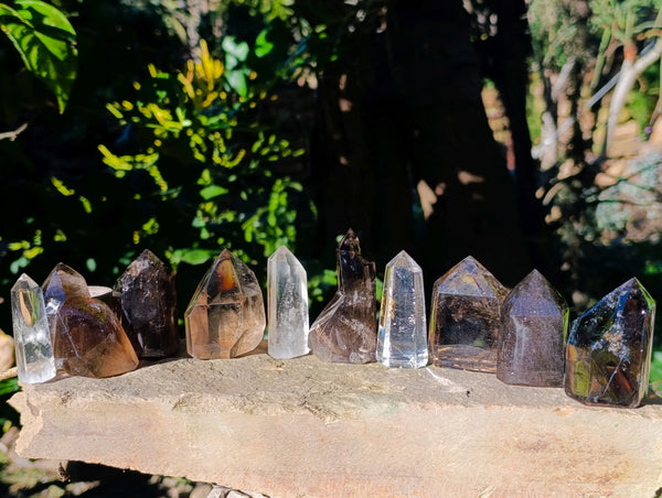 Polished Mix of Clear and Smokey Quartz Crystals x 12 From Ambatondrazaka, Madagascar - Toprock Gemstones and Minerals 