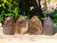 Polished Mix of Clear and Smokey Quartz Crystals x 12 From Ambatondrazaka, Madagascar - Toprock Gemstones and Minerals 