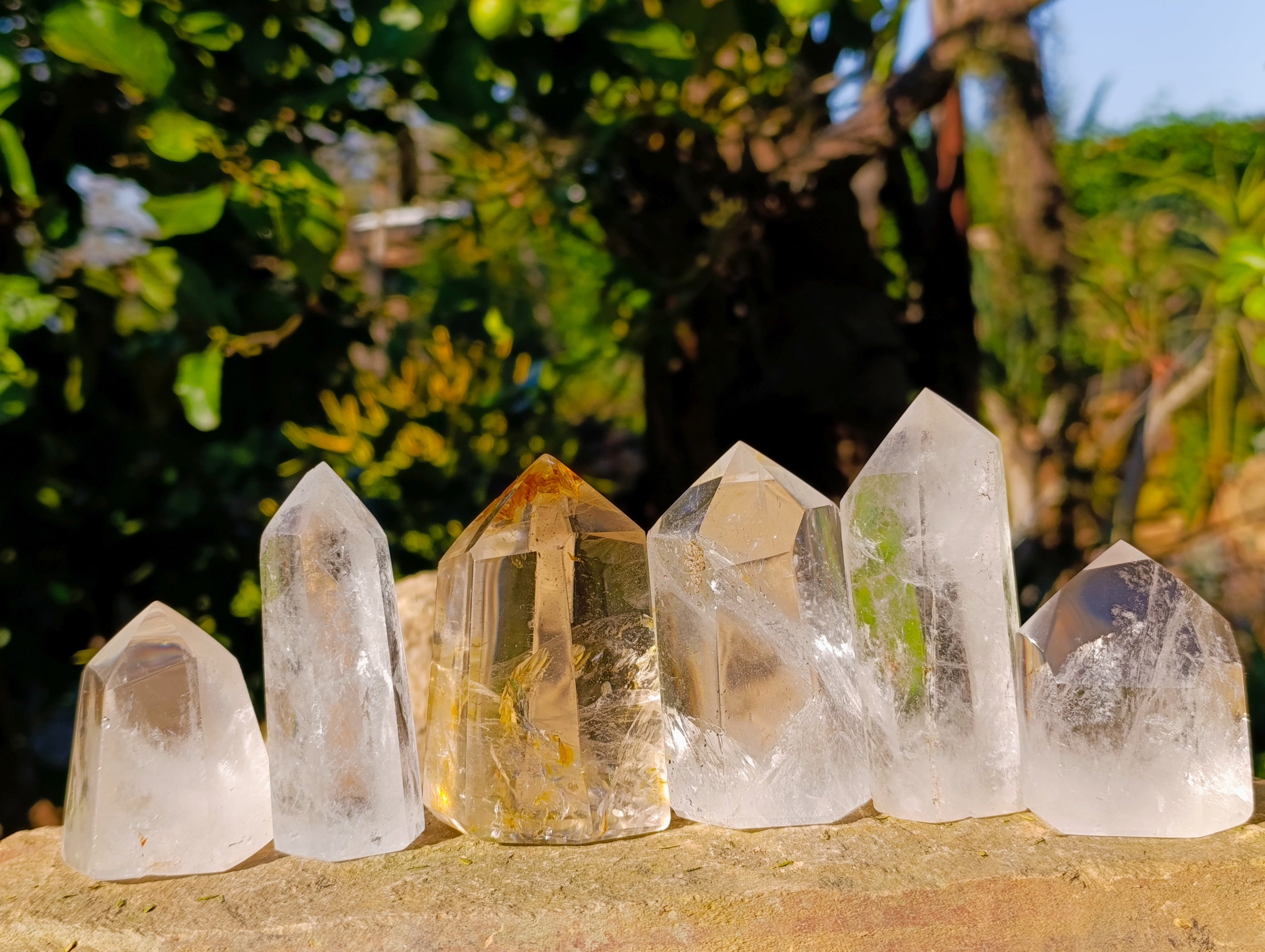 Polished Mix of Clear and Smokey Quartz Crystals with Specular Hematite Inclusion x 6 From Ambatondrazaka, Madagascar - Toprock Gemstones and Minerals 