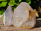 Polished Mix of Clear and Smokey Quartz Crystals with Golden Rutile Inclusion x 4 From Ambatondrazaka, Madagascar - Toprock Gemstones and Minerals 