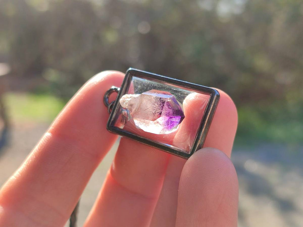 Hand Made Amethyst Pendants Set in Resin - Sold Per Item - From Southern Africa - Toprock Gemstones and Minerals 