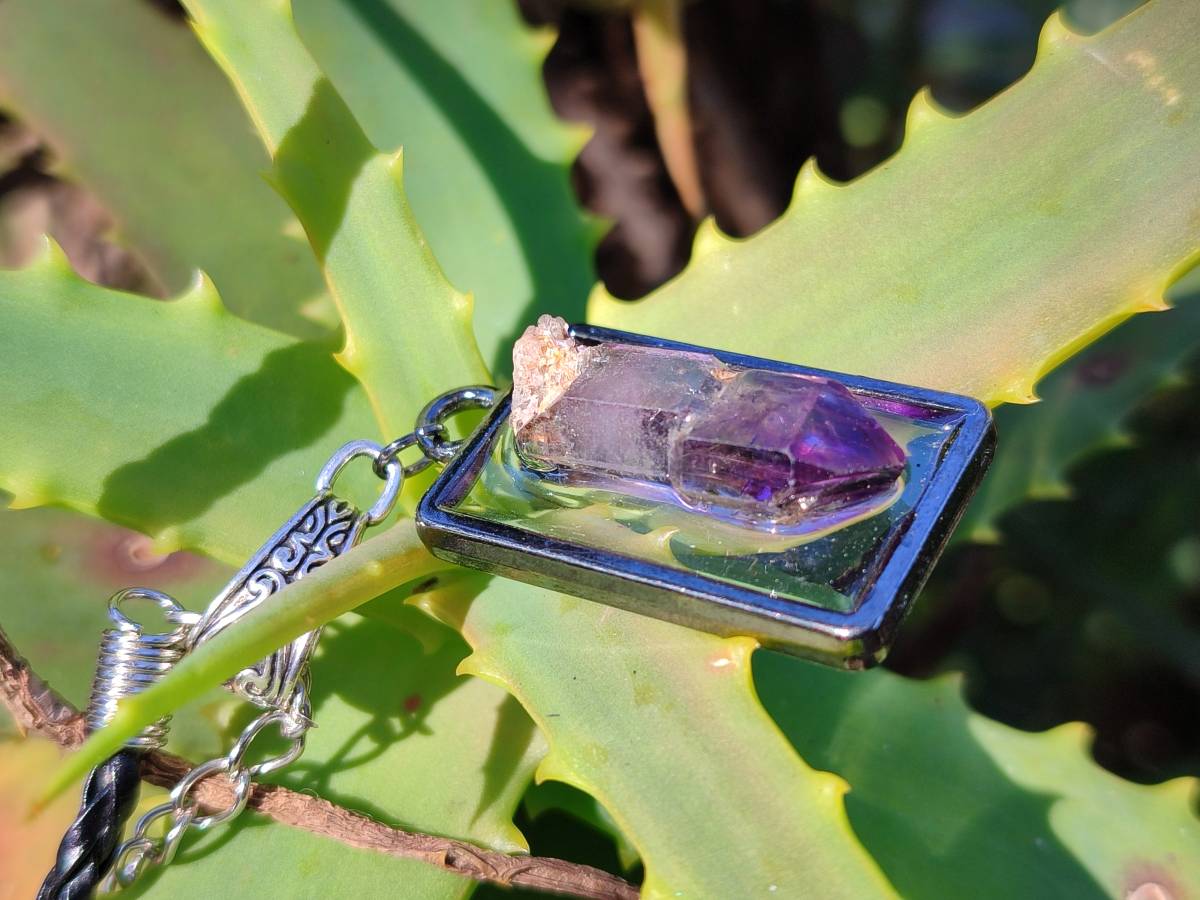 Hand Made Amethyst Pendants Set in Resin - Sold Per Item - From Southern Africa - Toprock Gemstones and Minerals 