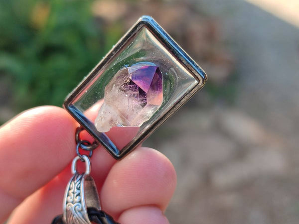 Hand Made Amethyst Pendants Set in Resin - Sold Per Item - From Southern Africa