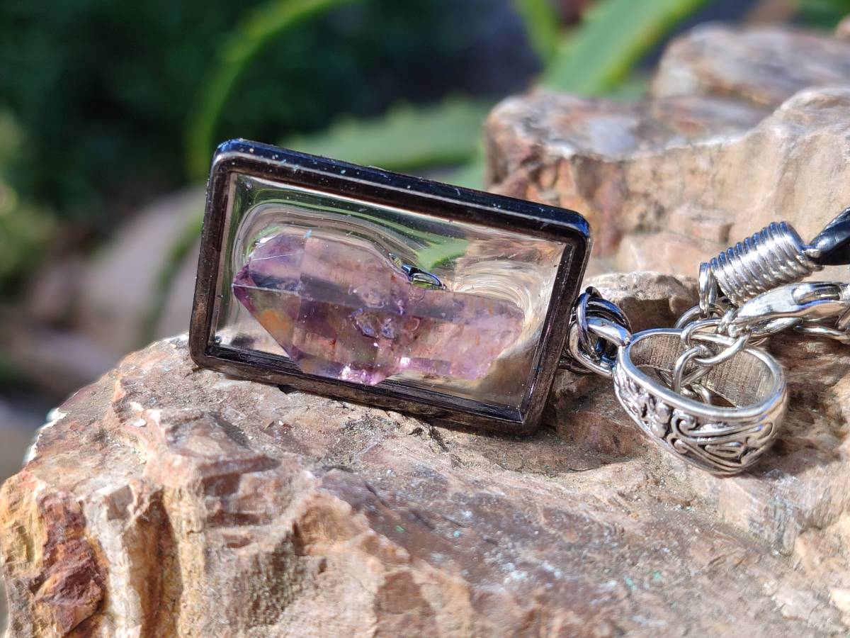 Hand Made Amethyst Pendants Set in Resin - Sold Per Item - From Southern Africa - Toprock Gemstones and Minerals 