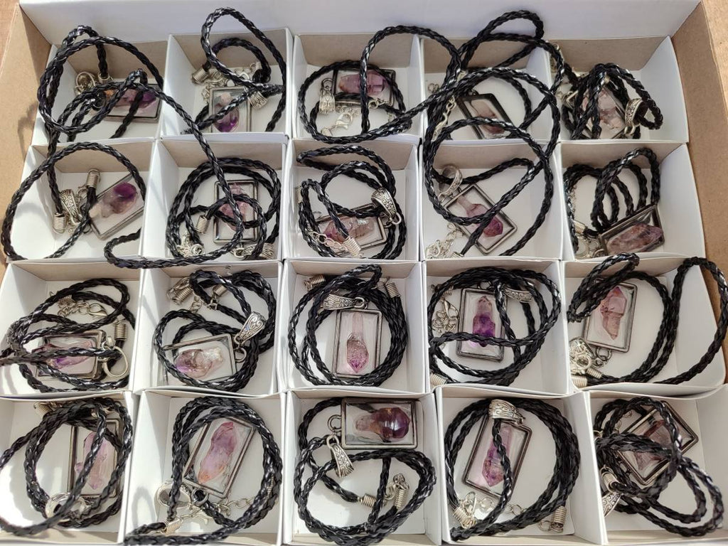 Hand Made Amethyst Pendants Set in Resin - Sold Per Item - From Southern Africa - Toprock Gemstones and Minerals 