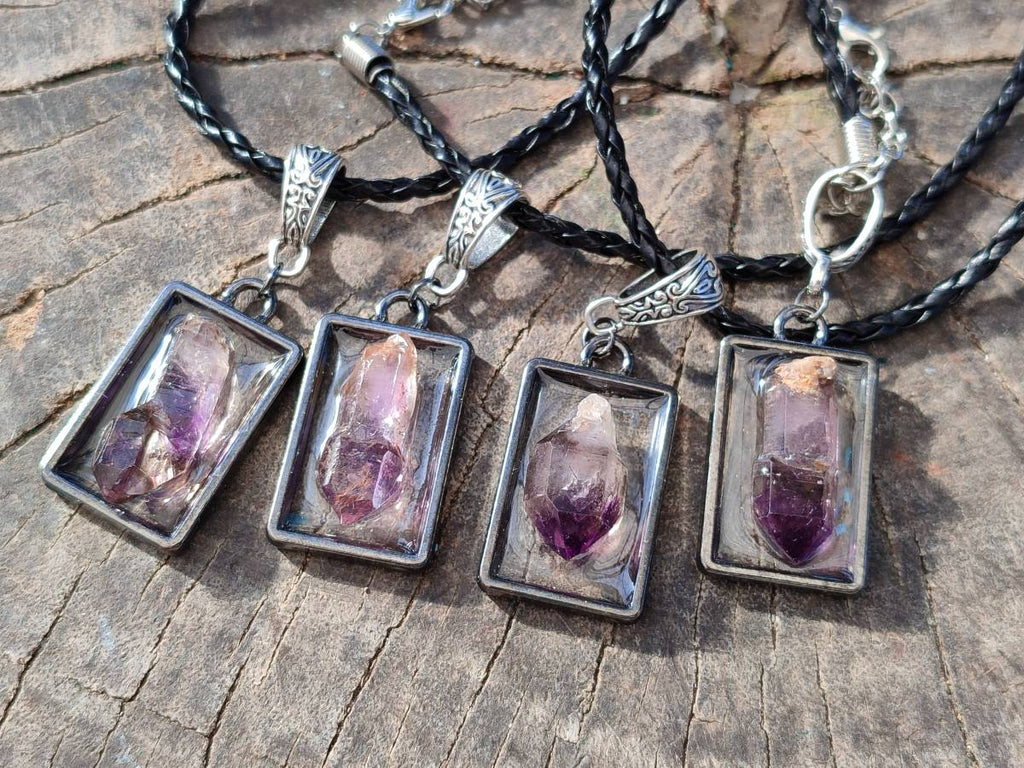 Hand Made Amethyst Pendants Set in Resin - Sold Per Item - From Southern Africa - Toprock Gemstones and Minerals 