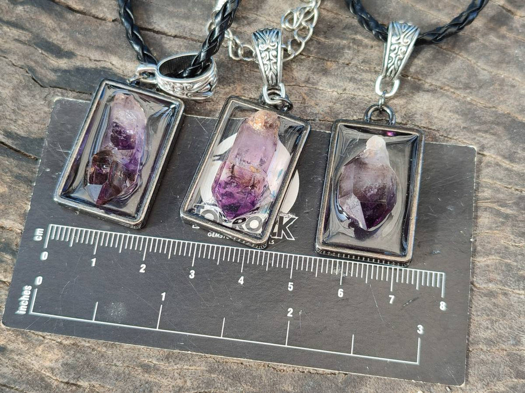 Hand Made Amethyst Pendants Set in Resin - Sold Per Item - From Southern Africa - Toprock Gemstones and Minerals 