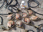 Hand Made Opalized Ammonite Pendants Set in Resin - Sold Per Item - From Southern Africa - Toprock Gemstones and Minerals 