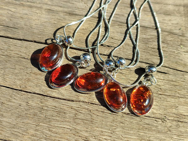 Hand Made Baltic Amber Pendants Set With Resin In Sterling Silver - Sold Per Item - From Southern Africa