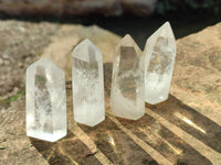 Polished Clear and Smokey Phantom Quartz Crystals with Rainbow Veils x 24 From Madagascar - Toprock Gemstones and Minerals 