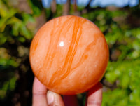 Polished Orange Twist Calcite Spheres x 3 From Madagascar