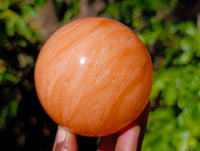 Polished Orange Twist Calcite Spheres x 3 From Madagascar
