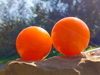 Polished Orange Twist Calcite Spheres x 3 From Madagascar