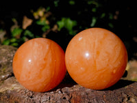 Polished Orange Twist Calcite Spheres x 3 From Madagascar