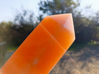 Polished Orange Twist Calcite Point x 1 From Maevantanana, Madagascar