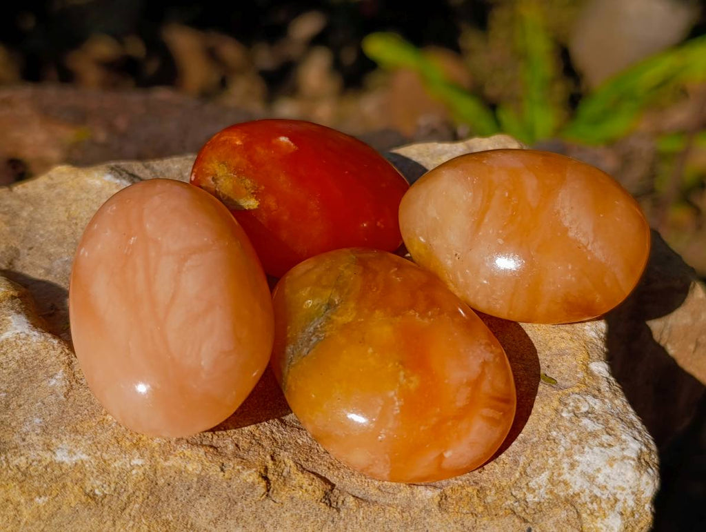 Polished Orange Twist Calcite Palm Stones x 28 From Madagascar - Toprock Gemstones and Minerals 