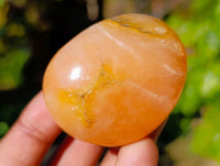 Polished Orange Twist Calcite Palm Stones x 28 From Madagascar - Toprock Gemstones and Minerals 