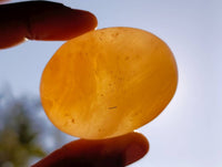 Polished Orange Twist Calcite Palm Stones x 28 From Madagascar - Toprock Gemstones and Minerals 
