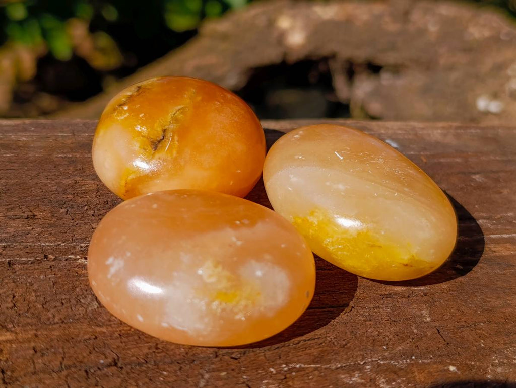 Polished Orange Twist Calcite Palm Stones x 28 From Madagascar - Toprock Gemstones and Minerals 