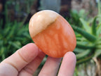 Polished Orange Twist Calcite Palm Stones x 24 From Madagascar - Toprock Gemstones and Minerals 