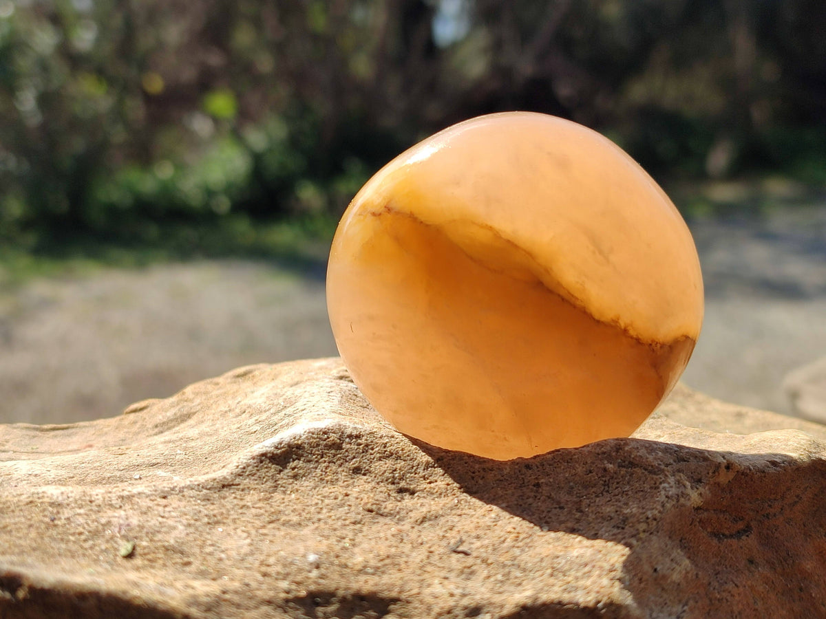 Polished Orange Twist Calcite Palm Stones x 24 From Madagascar - Toprock Gemstones and Minerals 