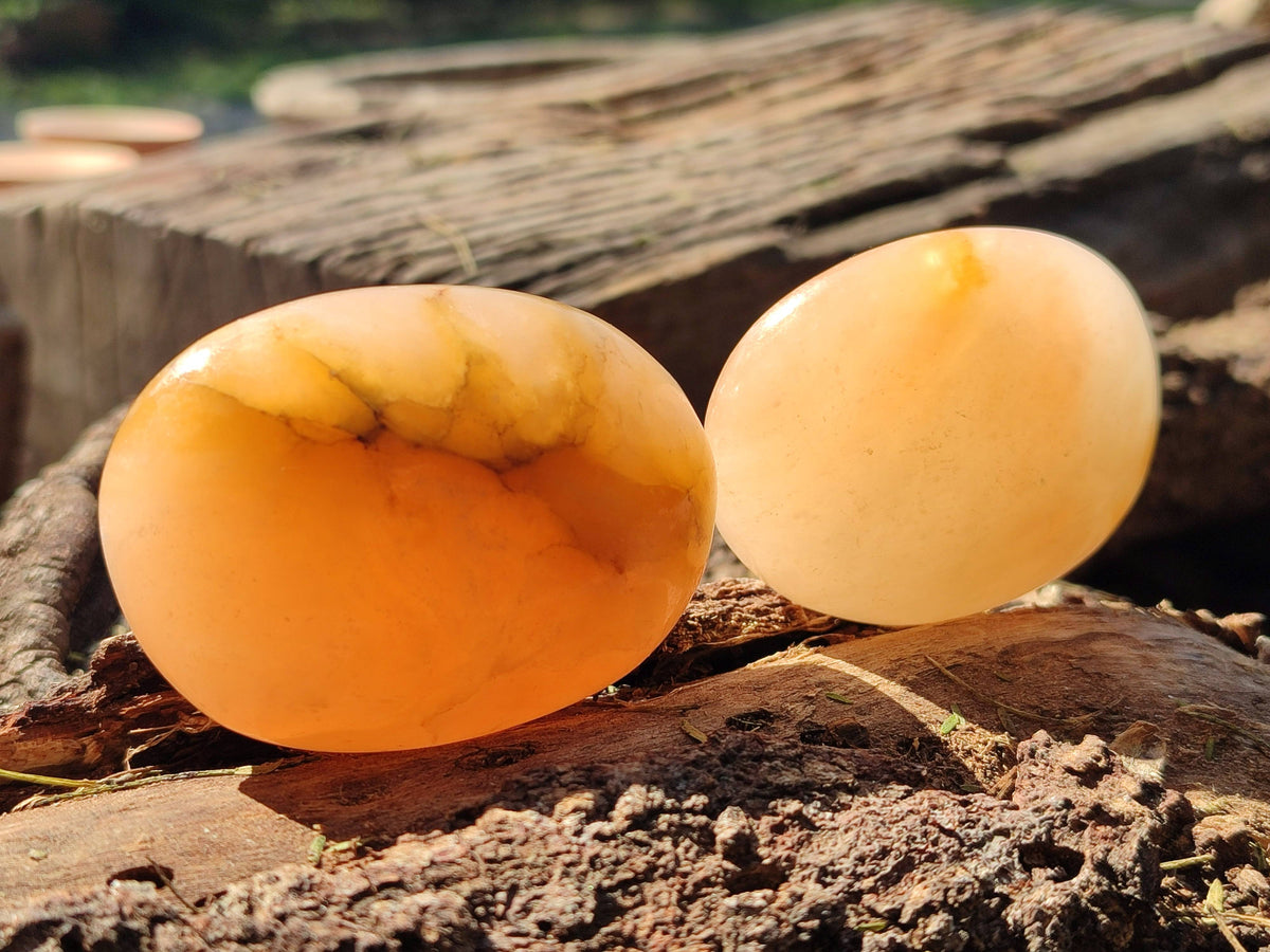 Polished Orange Twist Calcite Palm Stones x 24 From Madagascar - Toprock Gemstones and Minerals 