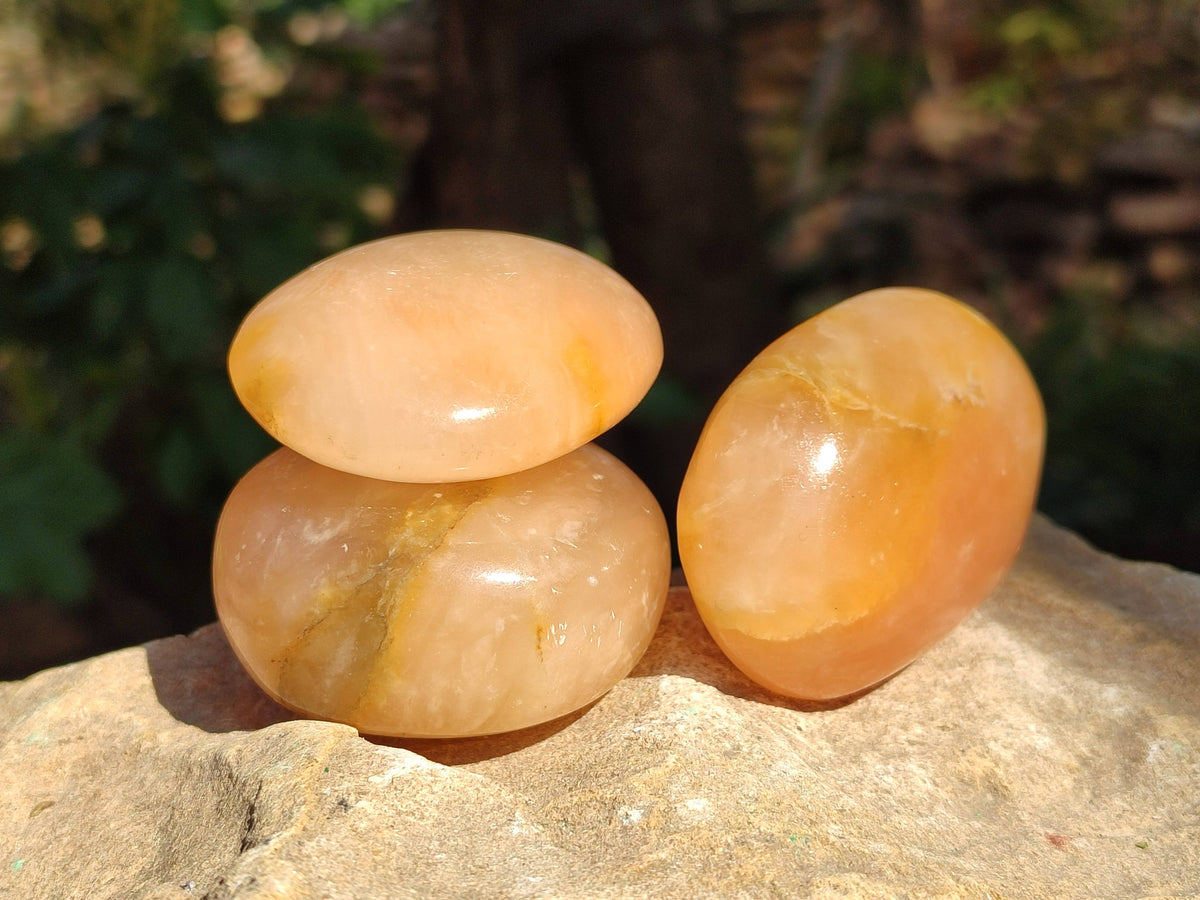 Polished Orange Twist Calcite Palm Stones x 24 From Madagascar - Toprock Gemstones and Minerals 