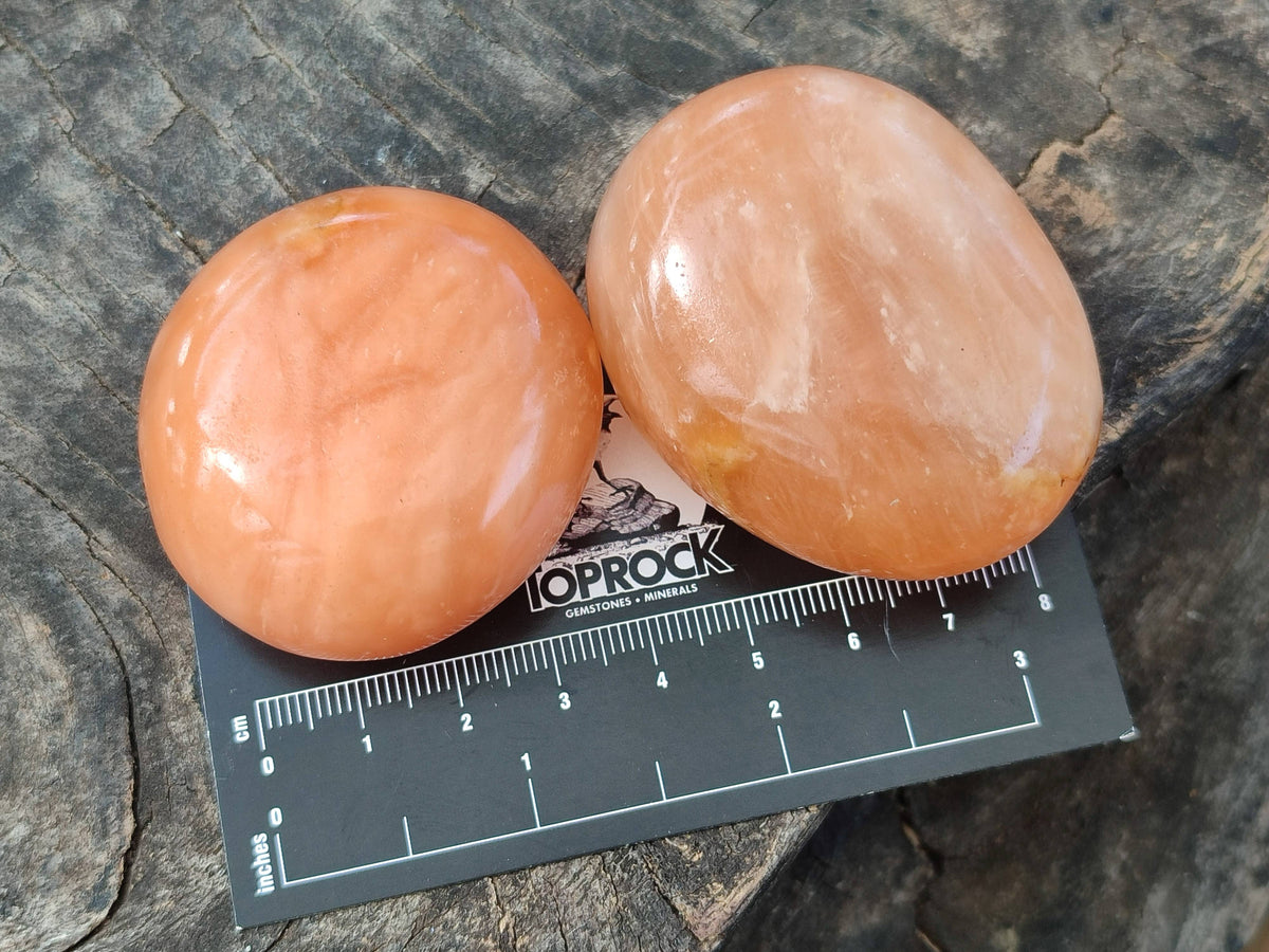 Polished Orange Twist Calcite Palm Stones x 24 From Madagascar - Toprock Gemstones and Minerals 