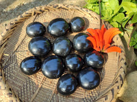 Polished Black Basalt Palm Stone x 12 From Antsirabe, Madagascar