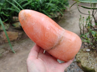 Polished Orange Twist Calcite Standing Free Form x 1 From Maevantanana, Madagascar