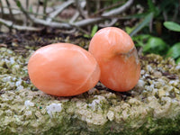 Polished Orange Twist Calcite Palm Stones x 20 From Maevantanana, Madagascar