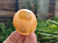 Polished Orange Twist Calcite Galets x 12 From Maevantanana, Madagascar